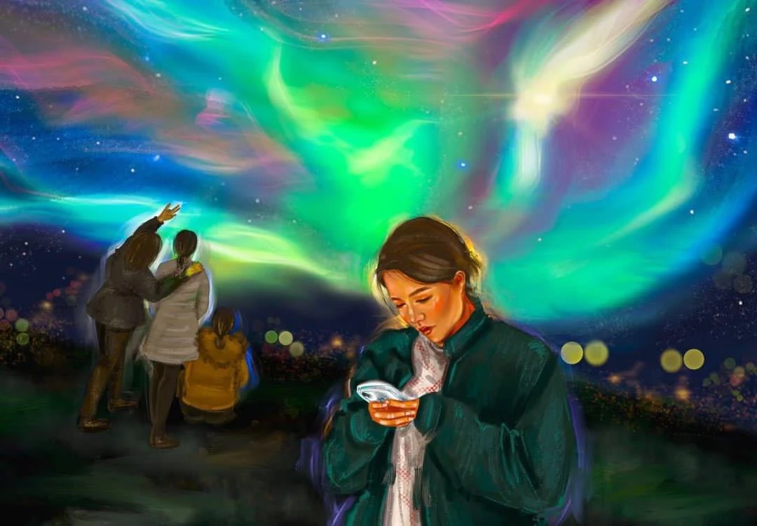 a girl in a green jacket looks down at her phone while three people behind her watch the northern lights over a city at night